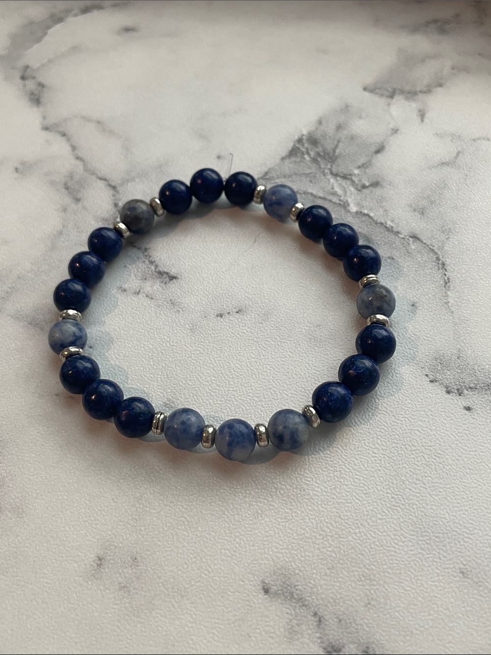 Natural stone, hand beaded elastic bracelet. 6.5 inches.